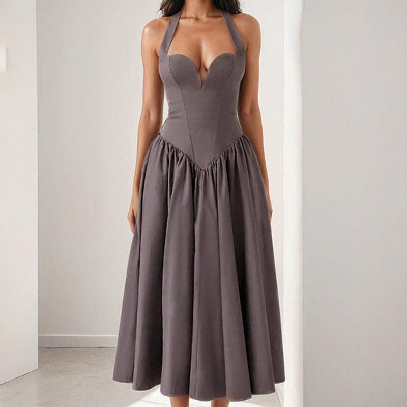 Women's satin halterneck midi dress in glamorous A-line cut with dramatic open back detail