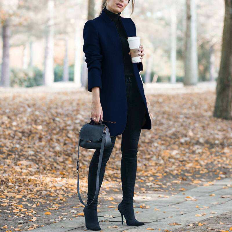 Women's tailored wool blend knee-length coat minimalist chic streamlined silhouette modern style