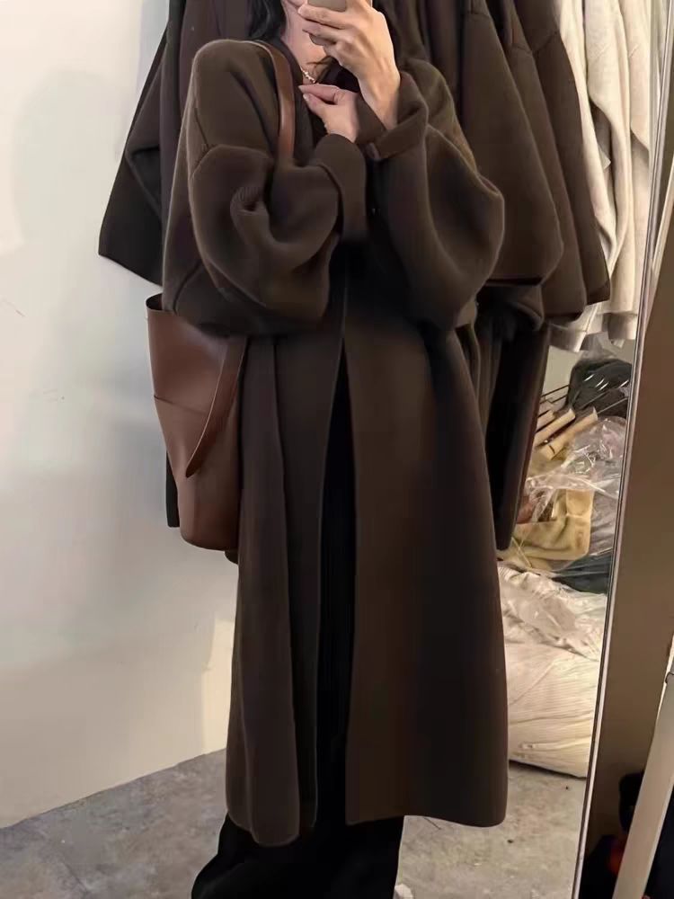 Women's oversized full-length wool knit cardigan coat with draped open front for effortless layering