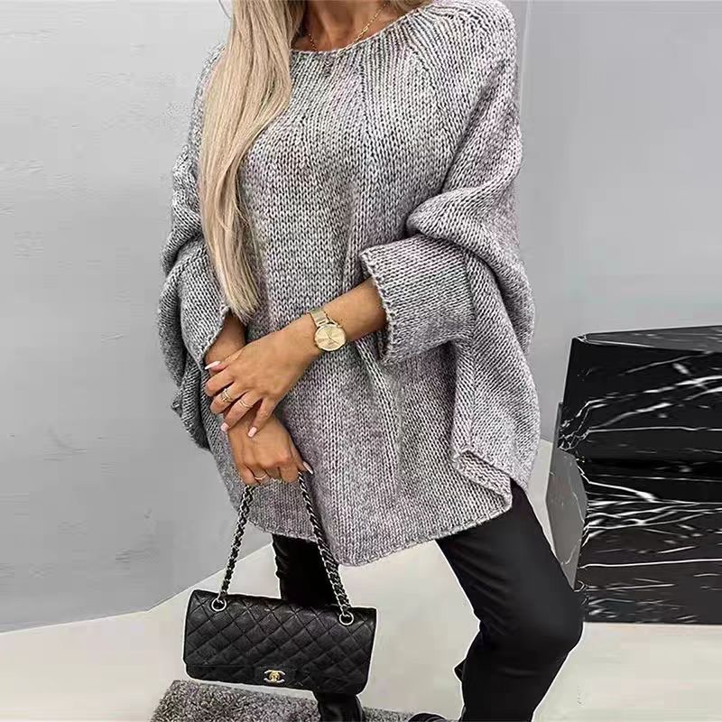 Women's loose-fit oversized knitted sweater in soft warm knit, cozy winter layering style