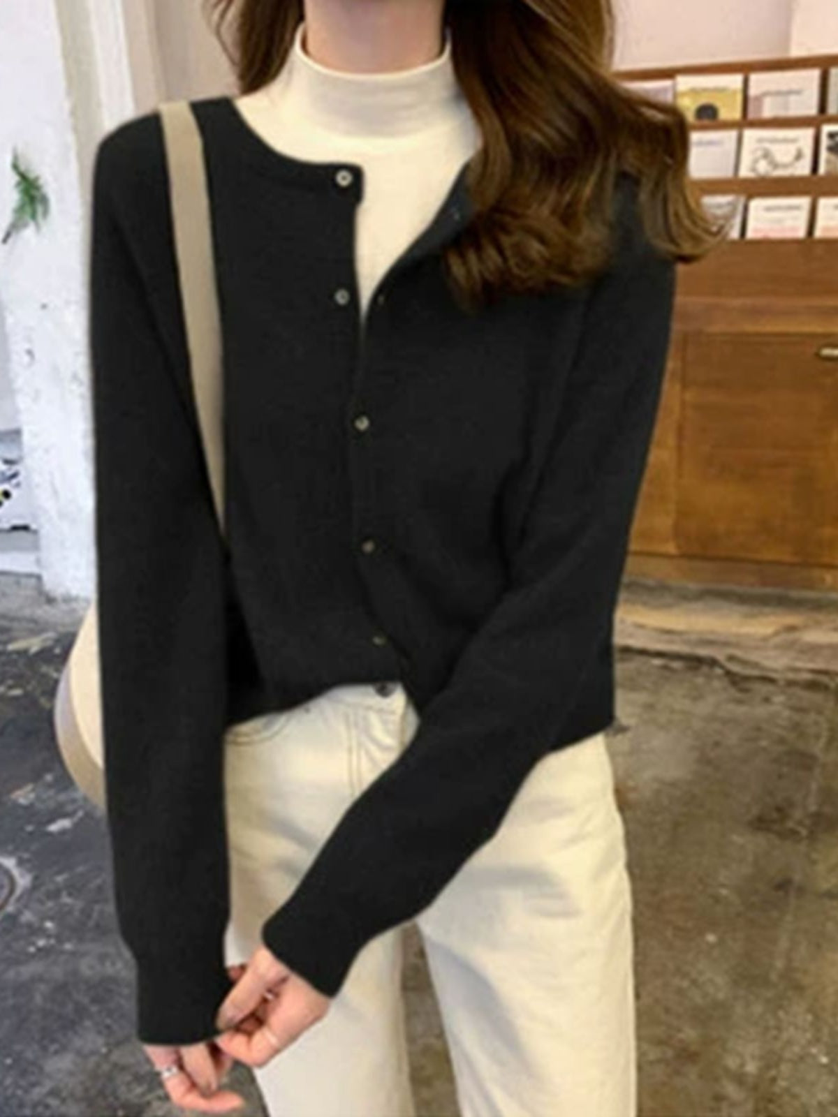 Women's relaxed fit soft knit cardigan with button-front closure and ribbed trim for cozy layering