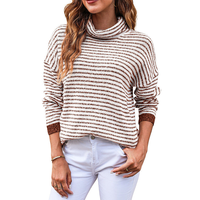 Women's striped turtleneck sweater relaxed fit wool texture knit with ribbed edges in warm autumn tones