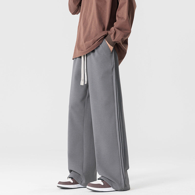 Unisex relaxed-fit cotton blend sweatpants with hemmed bottoms for lounge-to-street wear