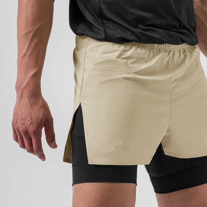 Men's black double-layer training shorts with built-in compression liner for runners