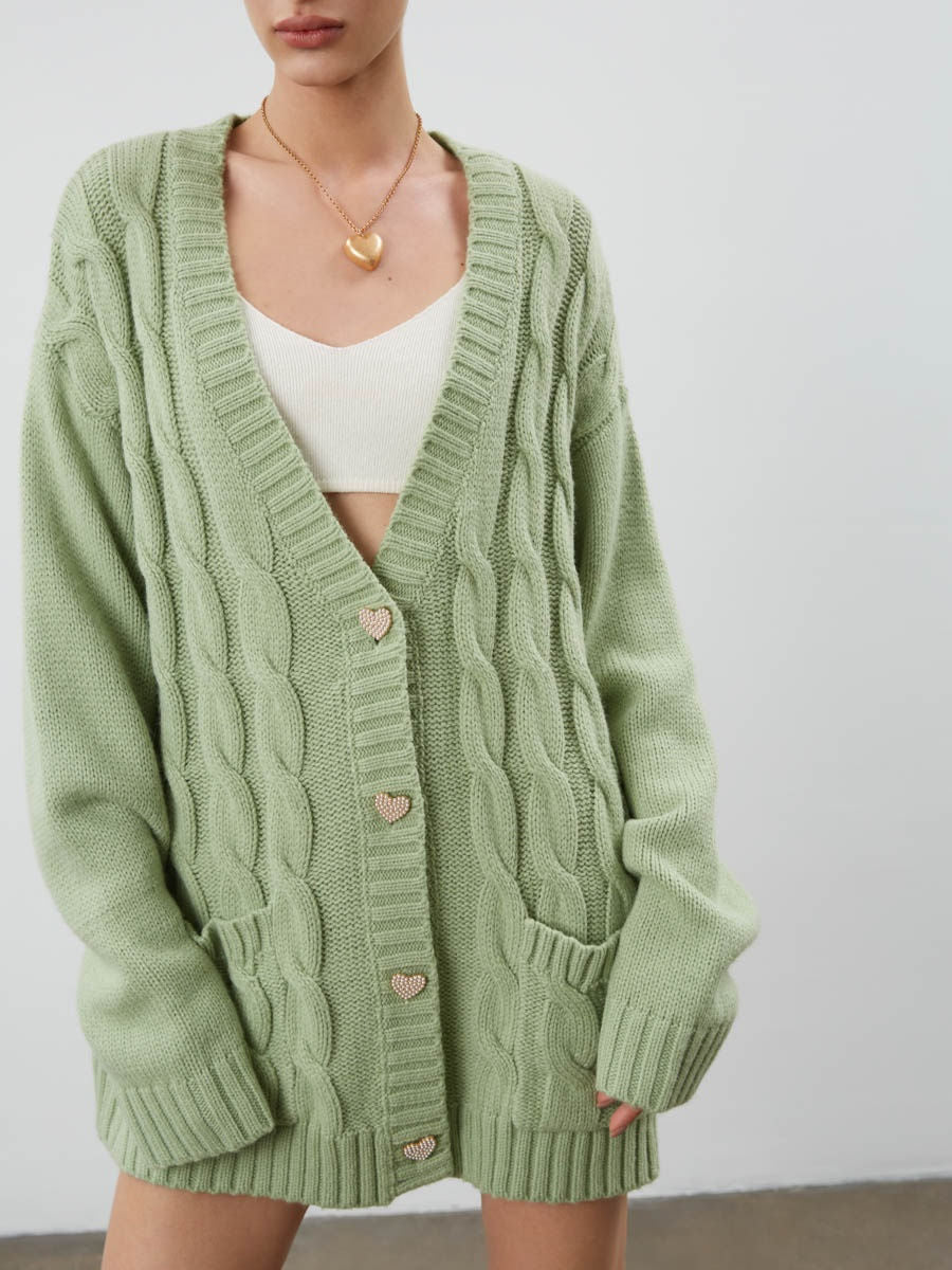 Women's oversized chunky cable knit cardigan cozy fit with heart buttons and pockets casual style