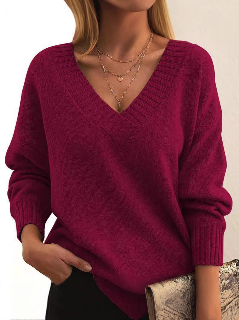 Women's relaxed V-neck knit sweater with ribbed cuffs and neckline for cozy all-day comfort