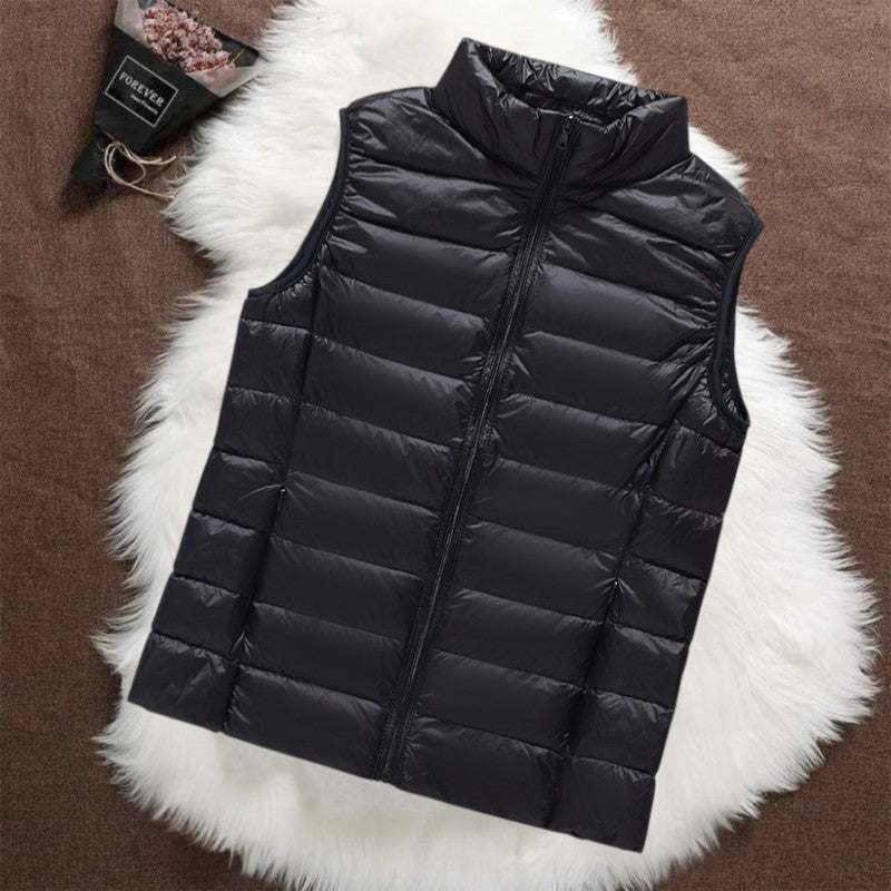 Women's quilted zip-front puffer vest lightweight sleeveless silhouette for effortless layering