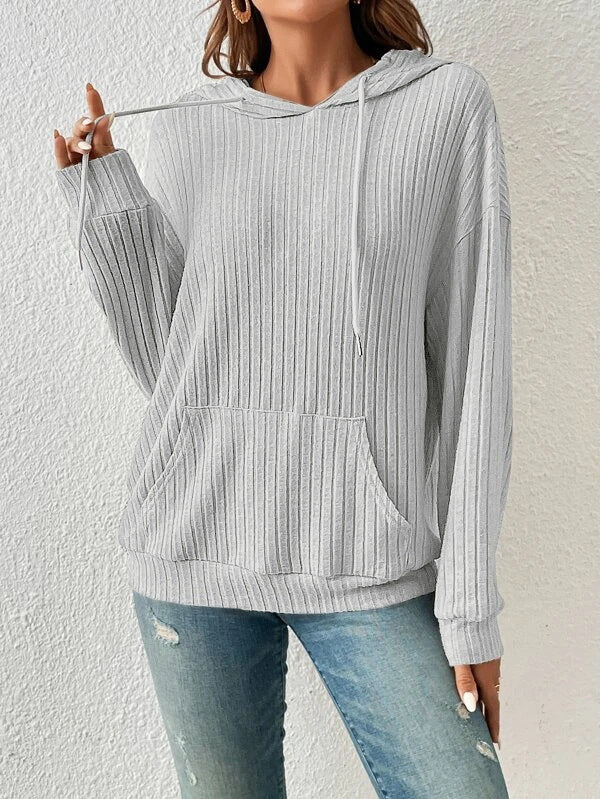 Women's relaxed-fit ribbed knit hoodie in cozy neutral tones with kangaroo pocket for everyday layering