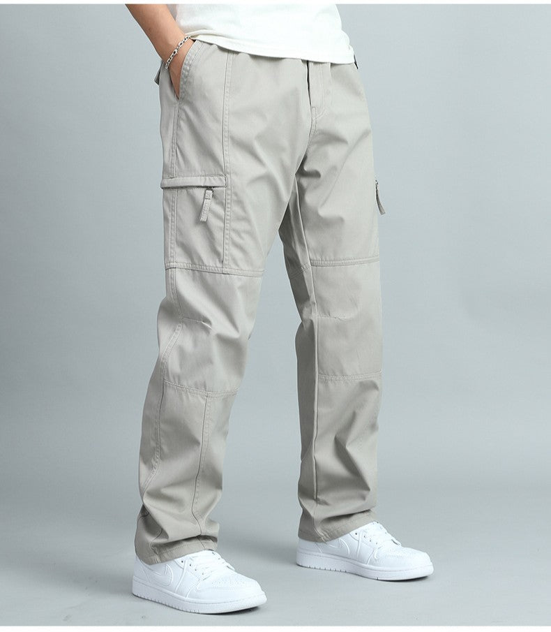 Men's relaxed fit cotton cargo pants in neutral tones with reinforced panels for durable workwear style