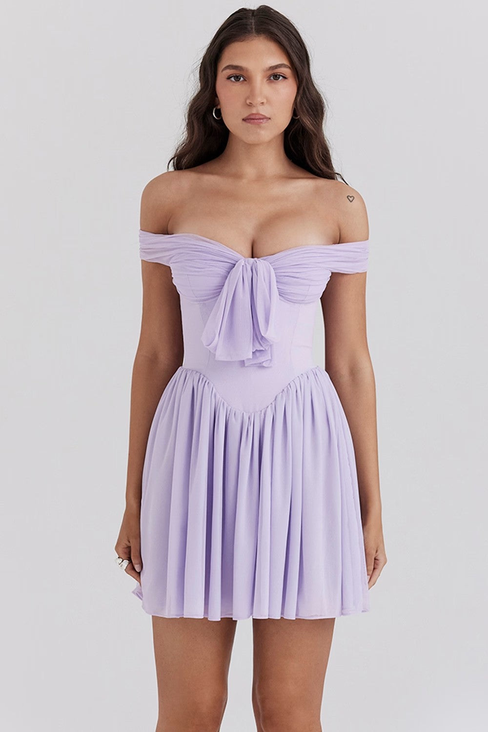 Light airy off-shoulder mini dress with front bow detail, smooth drape, feminine silhouette