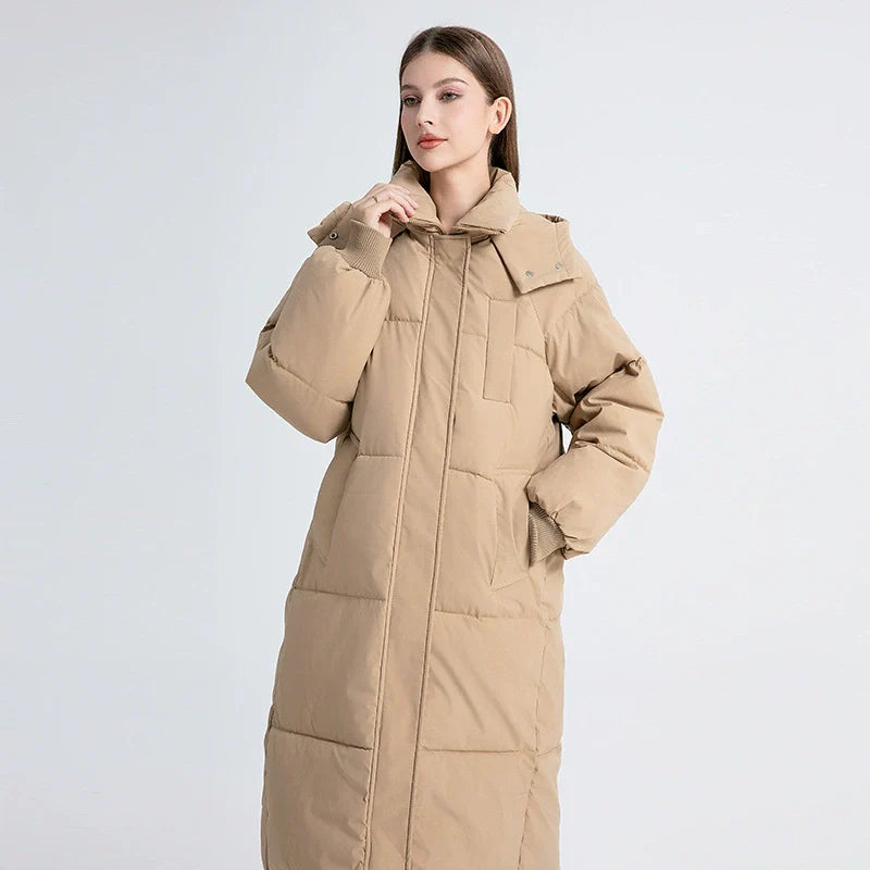 Women's longline oversized puffer coat quilted insulated with high collar hood for winter warmth
