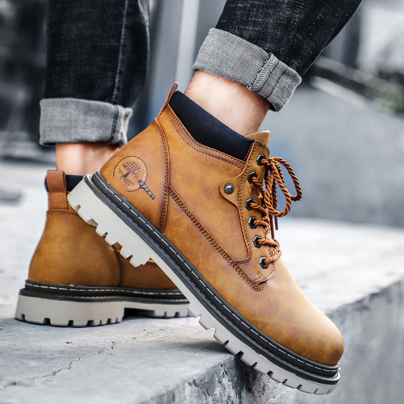 Men's black faux leather ankle boots lace-up style with aggressive lugged sole for urban wear