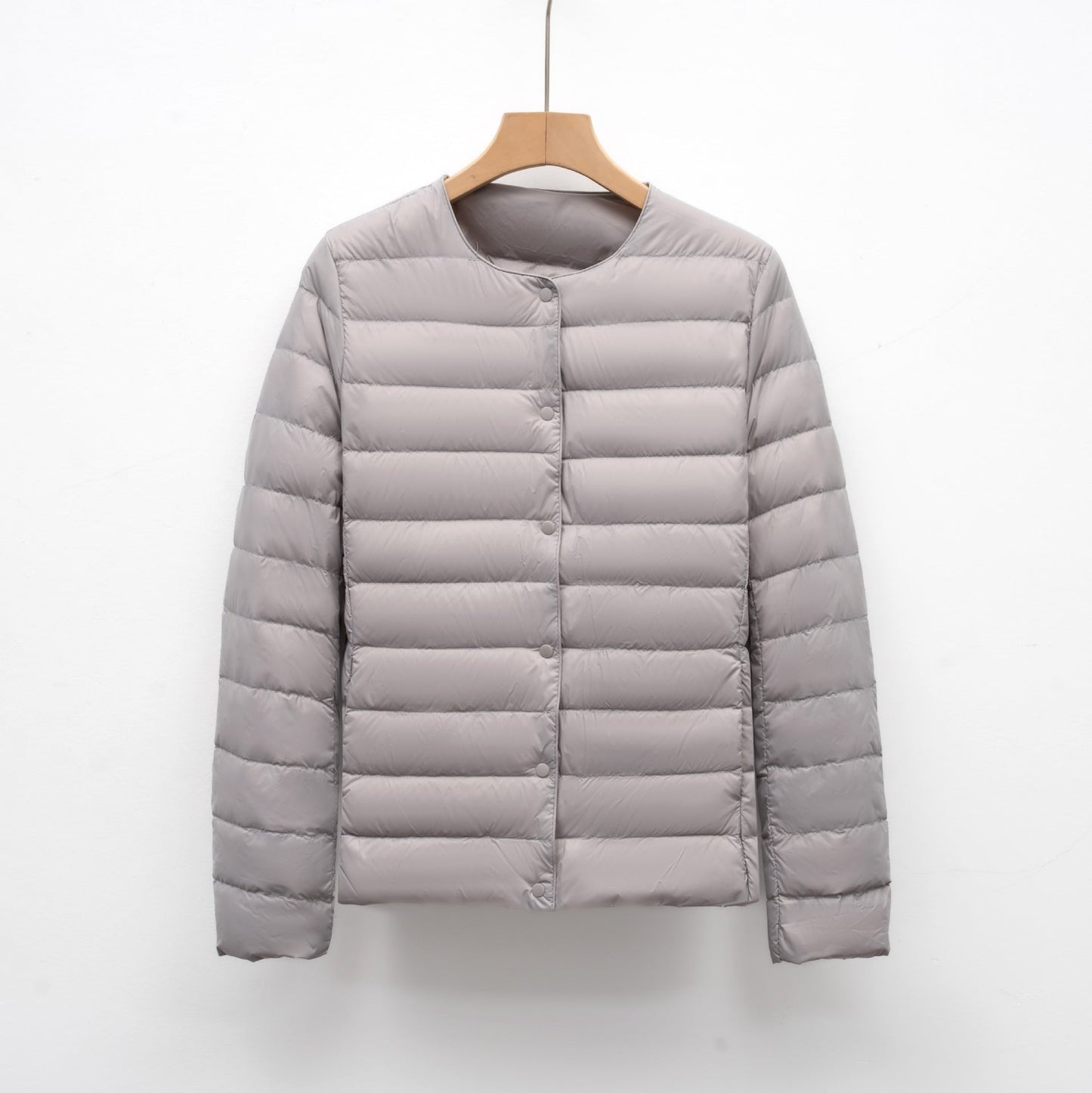 Women's slim fit quilted down jacket hip length snap front lightweight warm layer