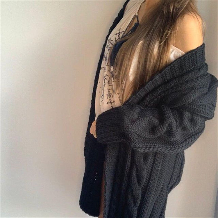 Women's oversized cable knit V-neck sweater wool blend long sleeves cozy sophisticated style