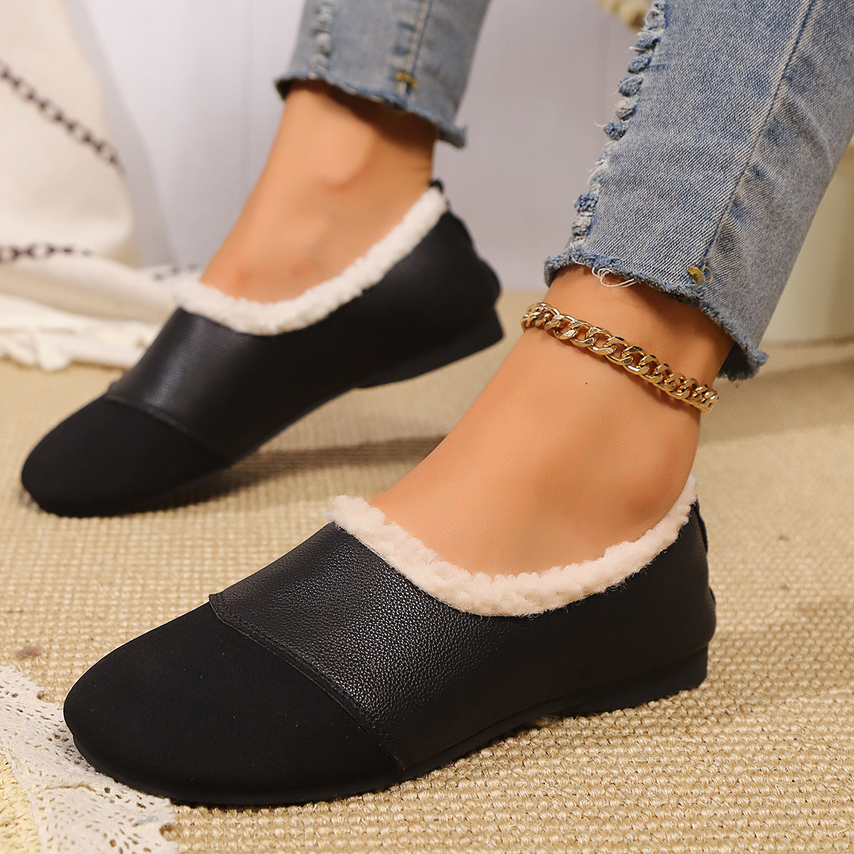 Women's faux leather slip-on moccasins with full fur lining and animal print toe detail