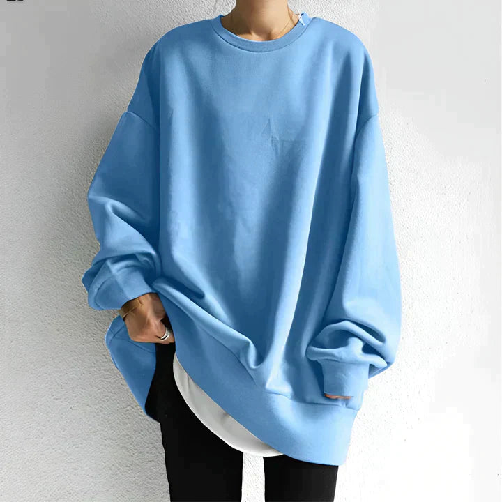Women's oversized knit pullover sweater in casual relaxed silhouette with cozy soft fabric for everyday wear