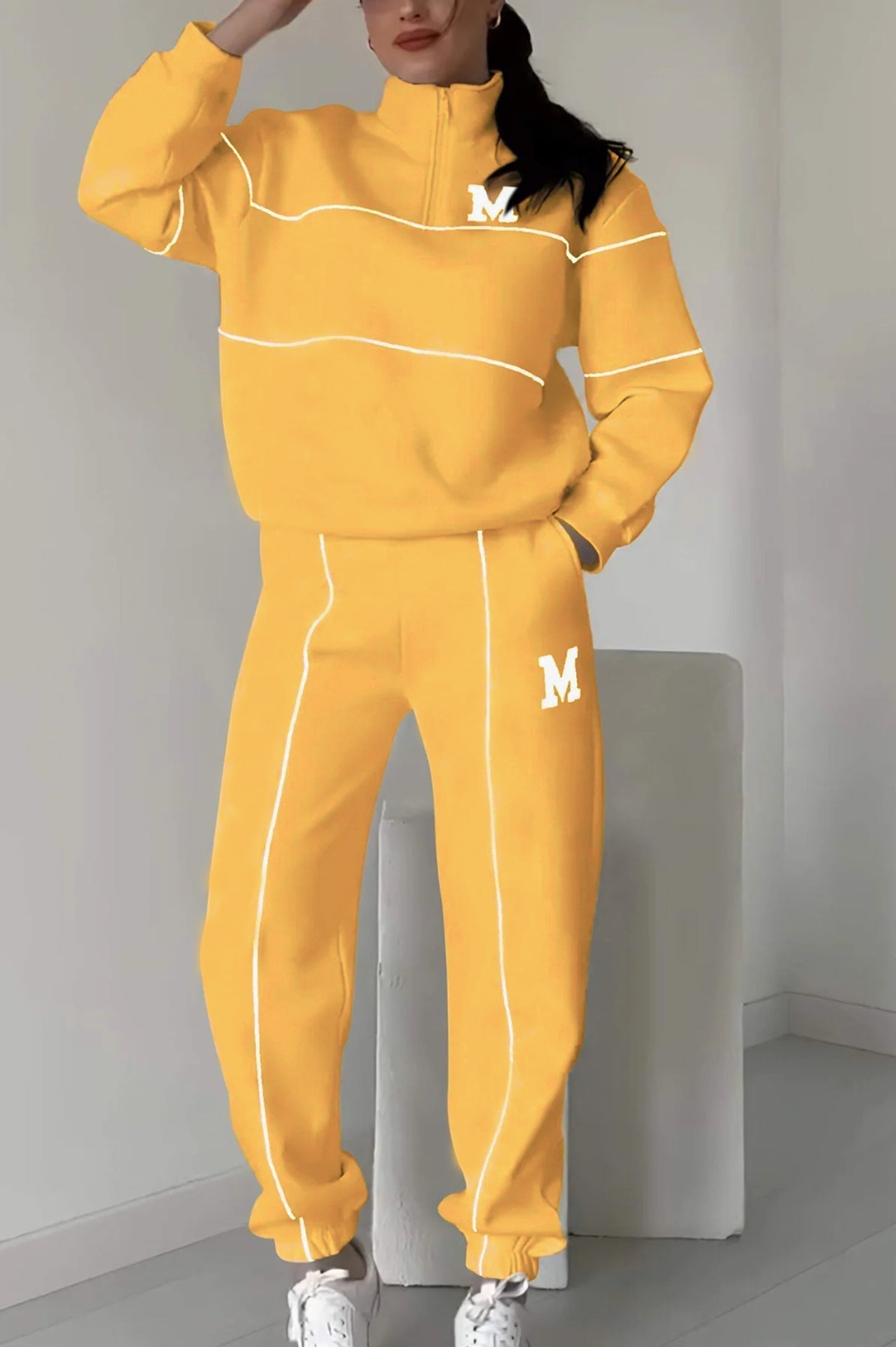 Women's relaxed fit tracksuit set with half zipper top and elastic waist pants in casual style
