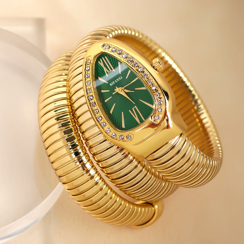 Women's snake-inspired quartz watch with custom bracelet, lightweight elegant gold-tone accessory