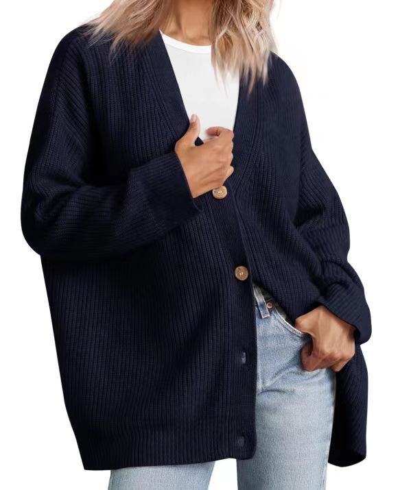 Women's striped button-down cardigan chic layering piece with bold contemporary stripe pattern