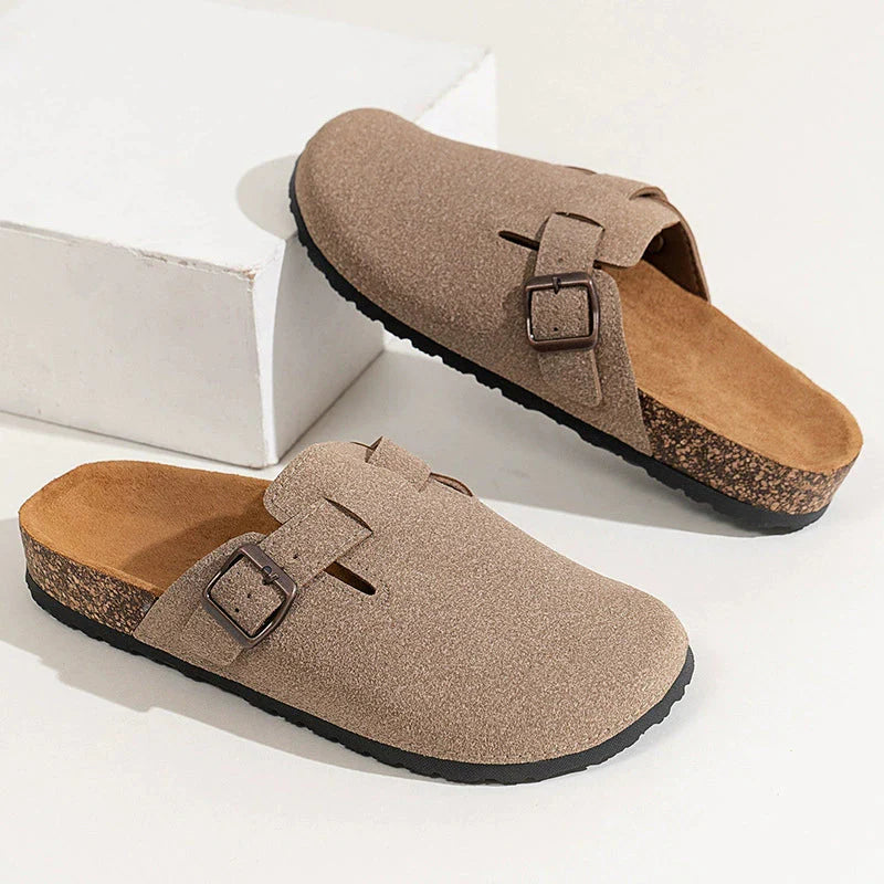 Women's suede-finish clogs with adjustable buckle strap and supportive cork footbed for all-day comfort