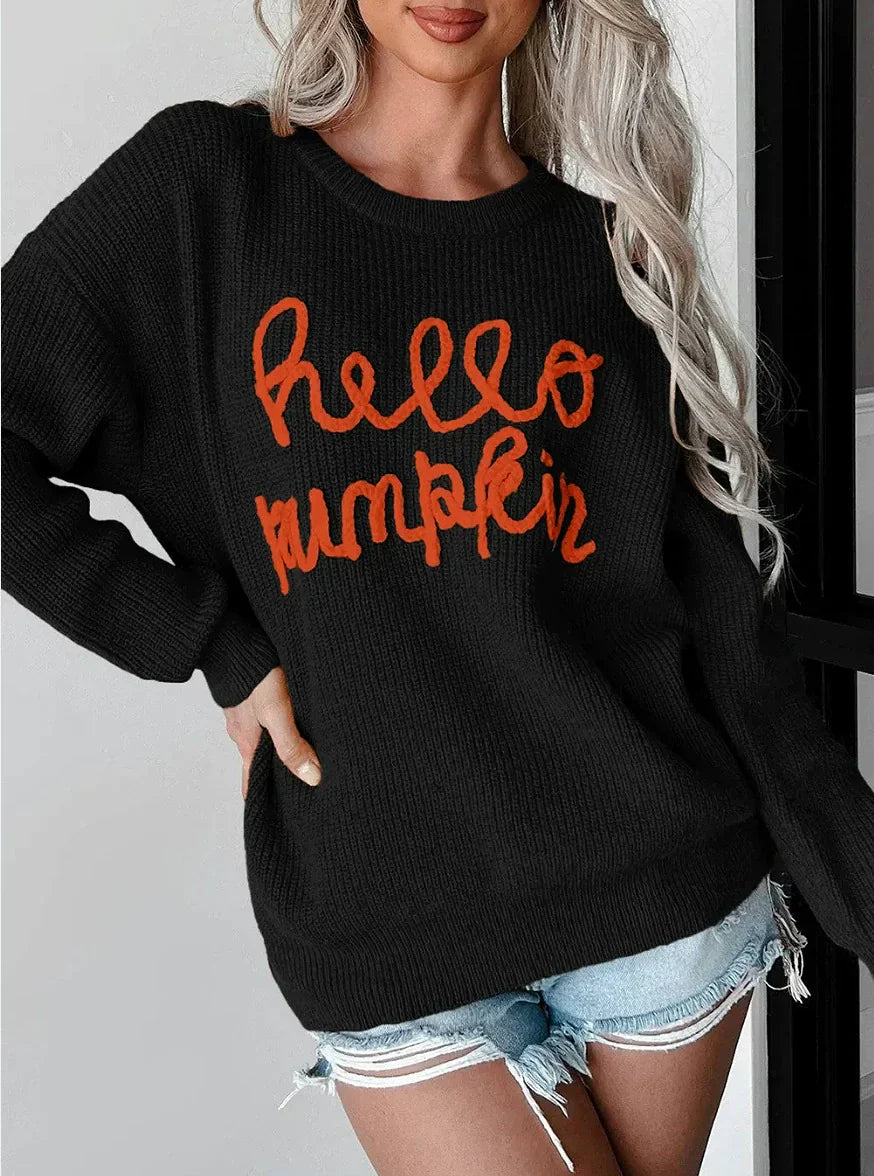 Women's wool blend relaxed fit sweater with ribbed texture and subtle letter detail for fall