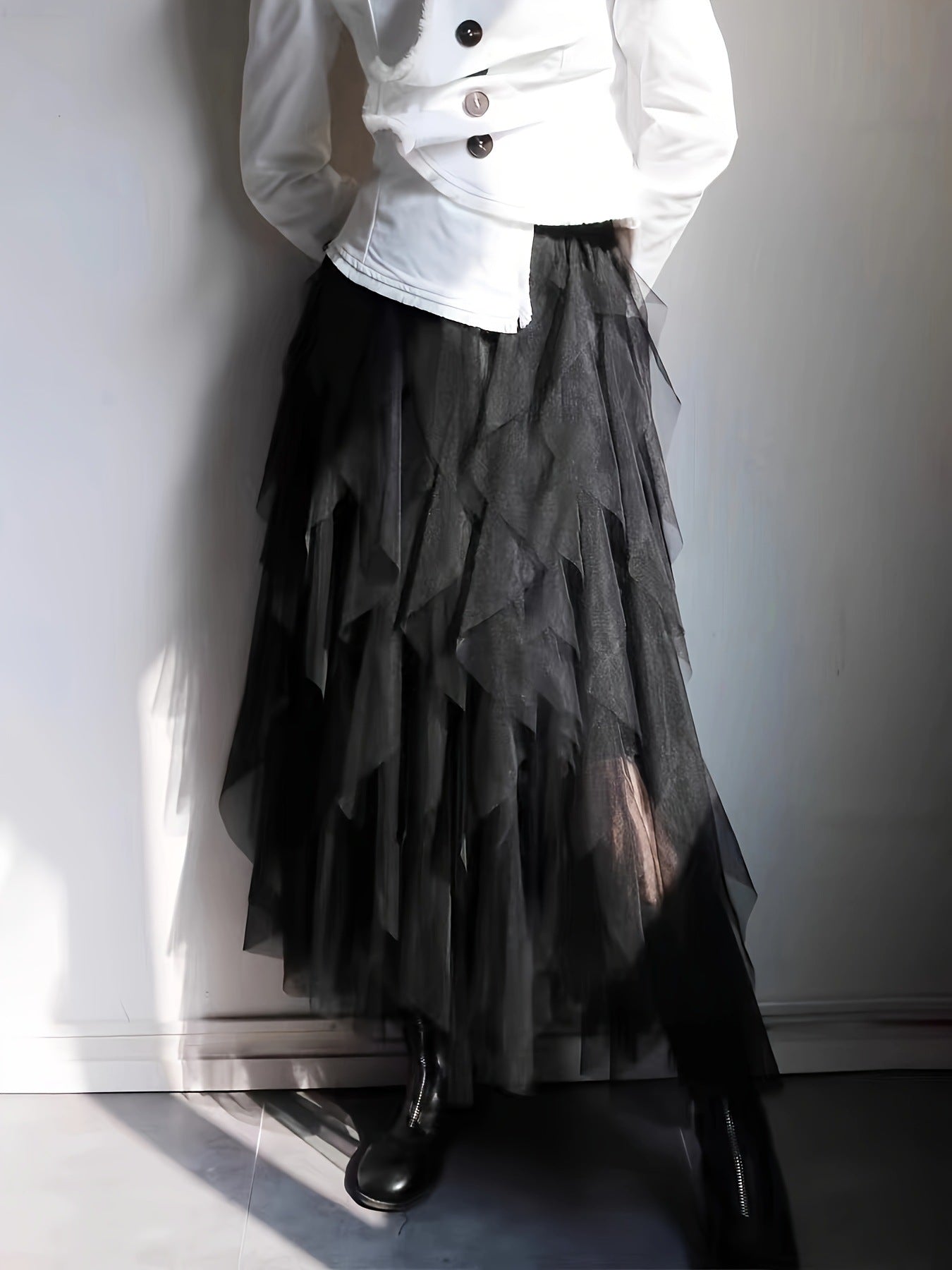 Women's black mesh midi skirt asymmetrical hem figure-flattering silhouette everyday chic style