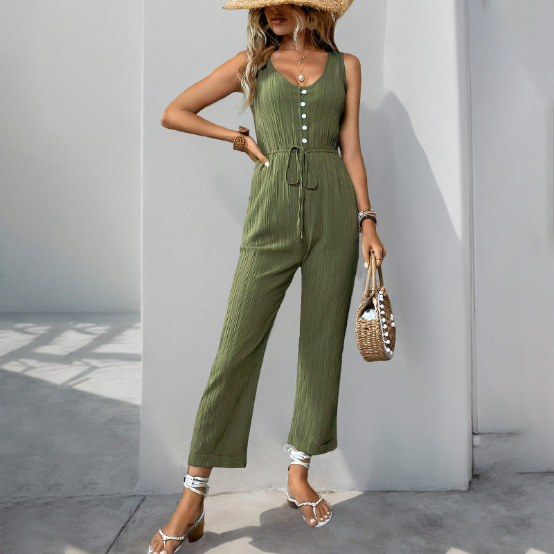 Women's sleeveless relaxed-fit jumpsuit in textured fabric with V-neck and belted waist