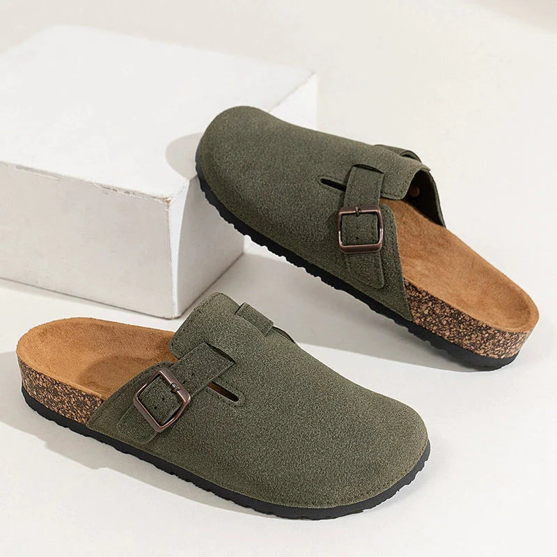 Women's suede finish clogs with adjustable buckle strap and supportive cork footbed for all-day comfort