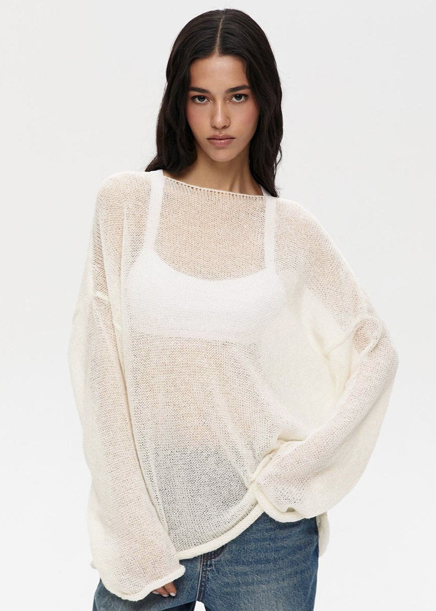 Pastel pink semi-sheer knit sweater women relaxed silhouette lightweight ethereal layering piece