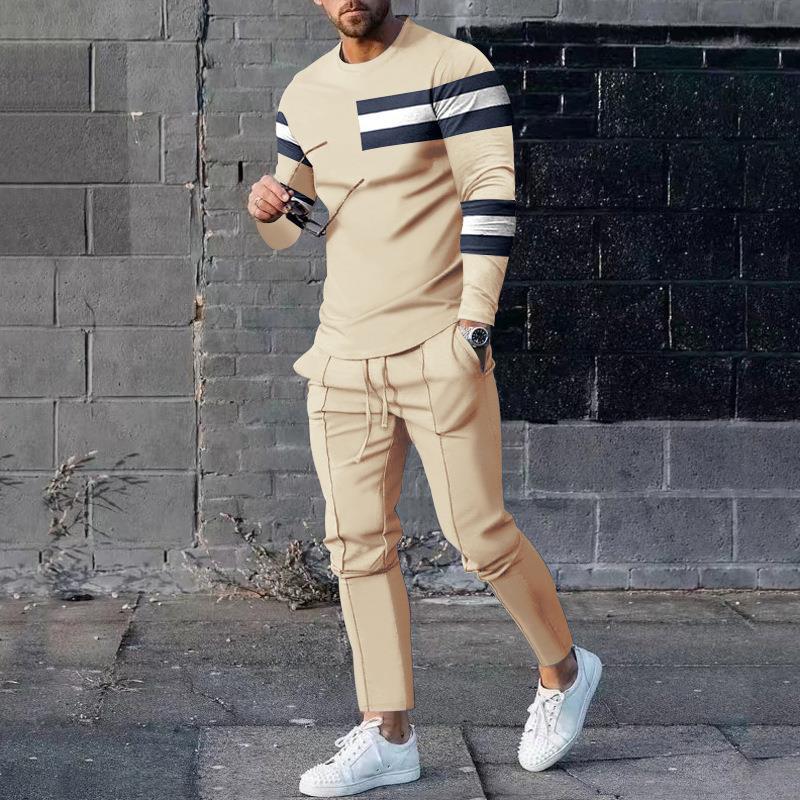Men's slim fit two-piece tracksuit set with bold 3D print pullover and tapered stretch pants