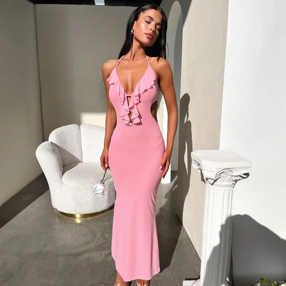 Women's slim-fit maxi dress with ruched neckline, adjustable straps, and fluid lightweight drape