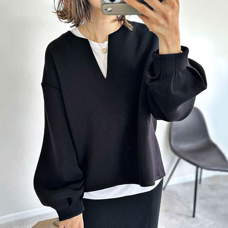 Women's oversized cotton V-neck top in airy relaxed fit with long sleeves for casual everyday wear