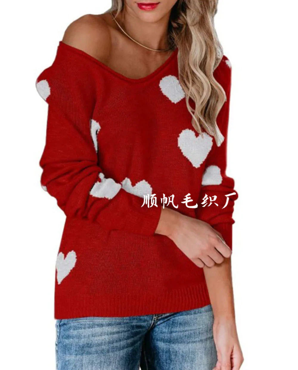 Women's red Christmas knit sweater with heart print design, cozy festive style for holiday season