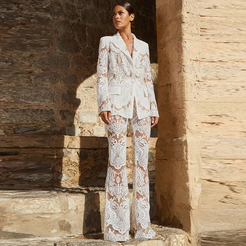 Women's black tailored blazer and mesh pants set with sophisticated elegant cut and refined fit