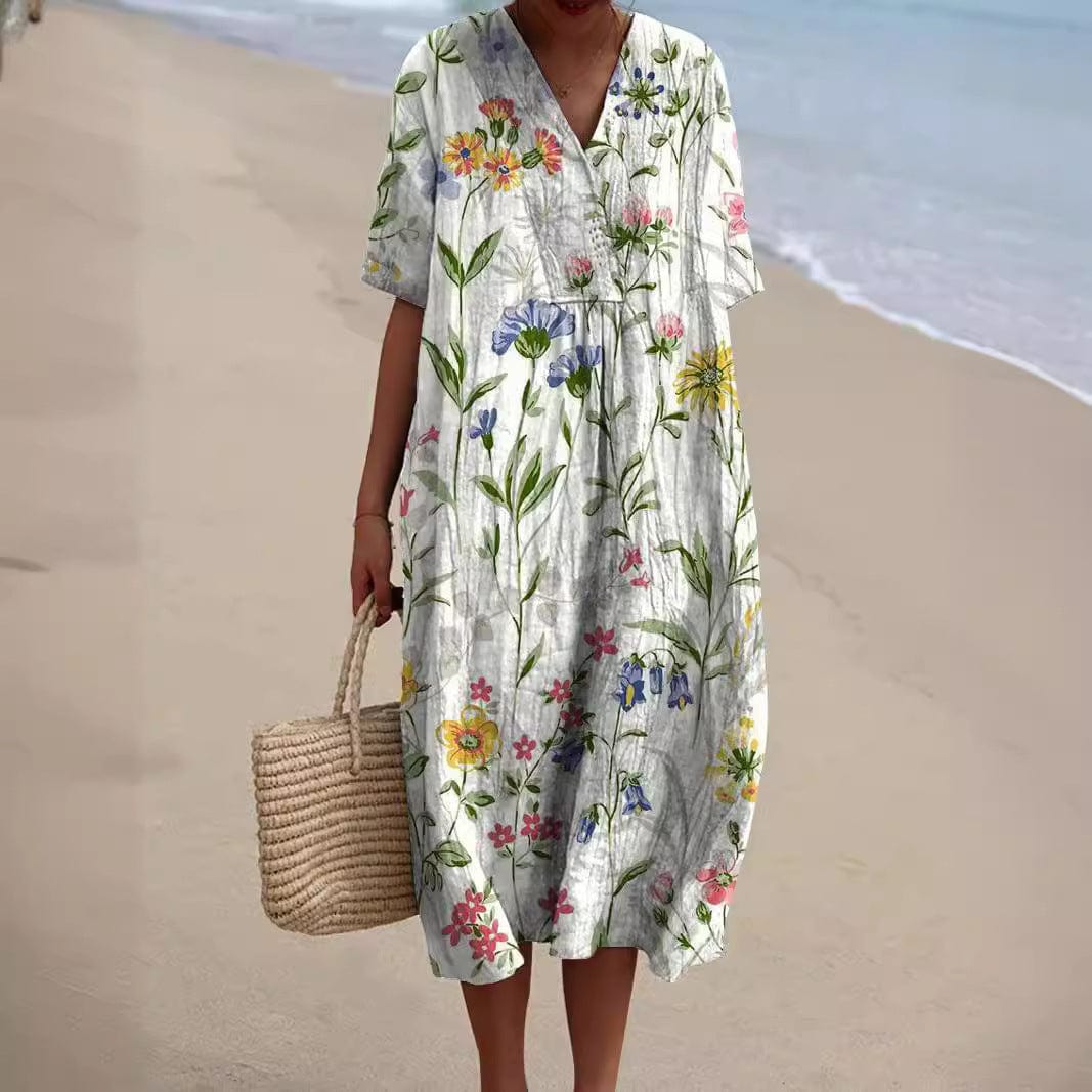 Women's light floral print summer dress, elegant airy cut, multicolored pattern, beach-ready comfort