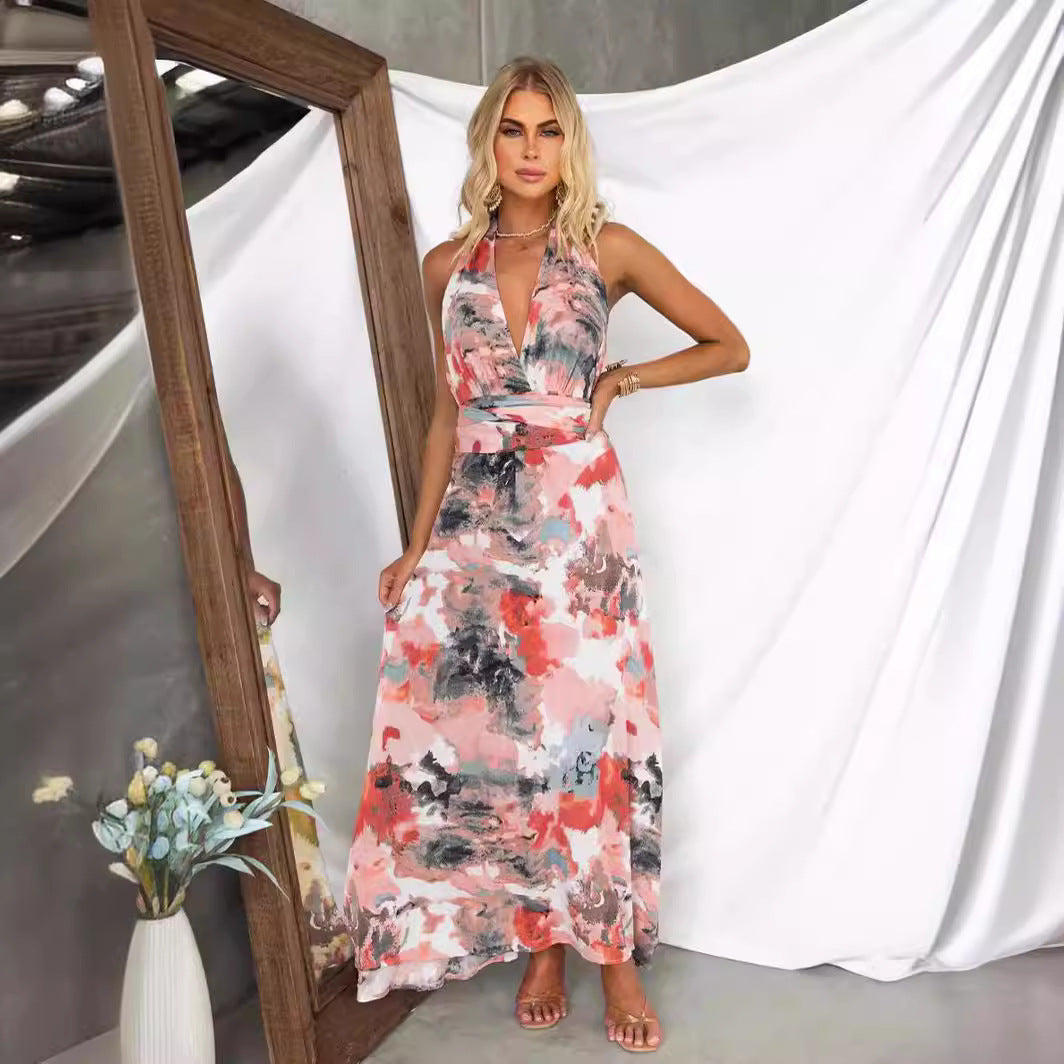 Women's flowy maxi A-line dress with V-neck tie-back detail in lightweight artistic print fabric