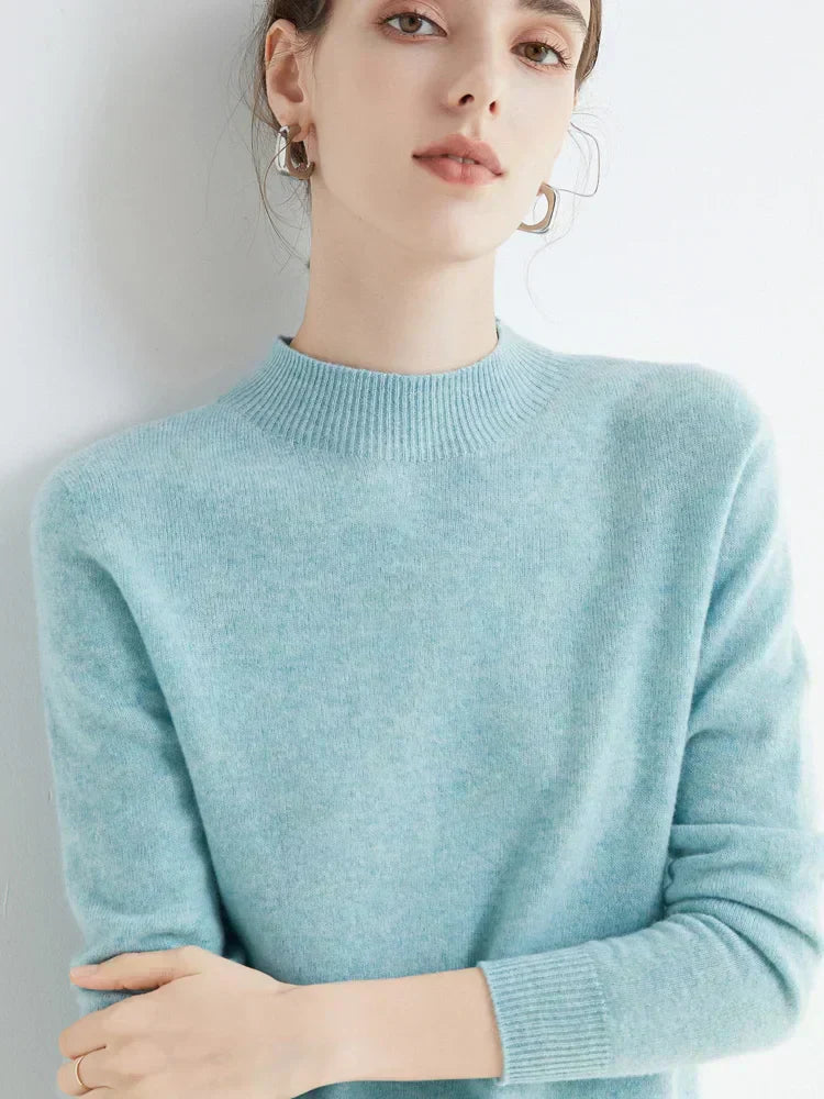 Elegant women's knit sweater in neutral tones, slim office-ready silhouette with timeless versatile design
