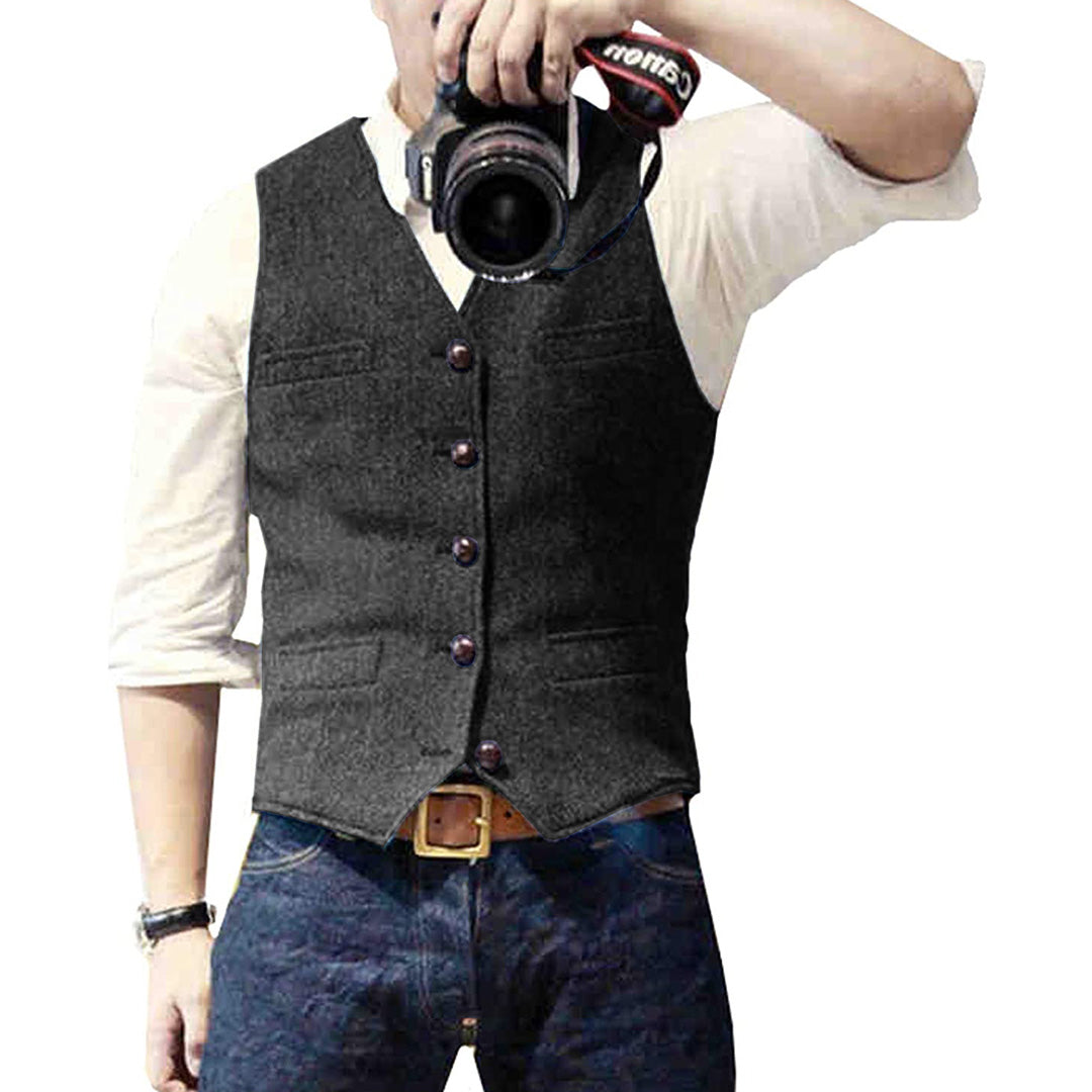 Men's slim fit blue denim vest with button front closure and functional pockets for casual wear