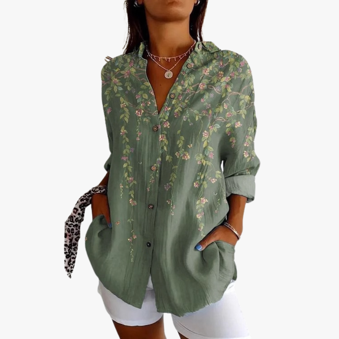 Women's white linen blouse with handcrafted embroidery, relaxed elegant fit for timeless artisan style