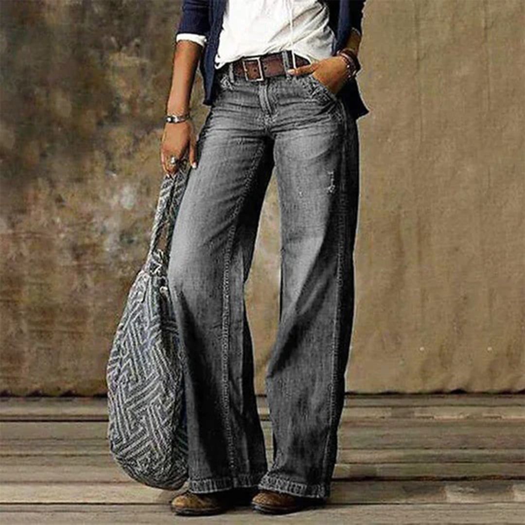 Relaxed vintage wide-leg pants in neutral tone, tailored silhouette with effortless drape for polished everyday style