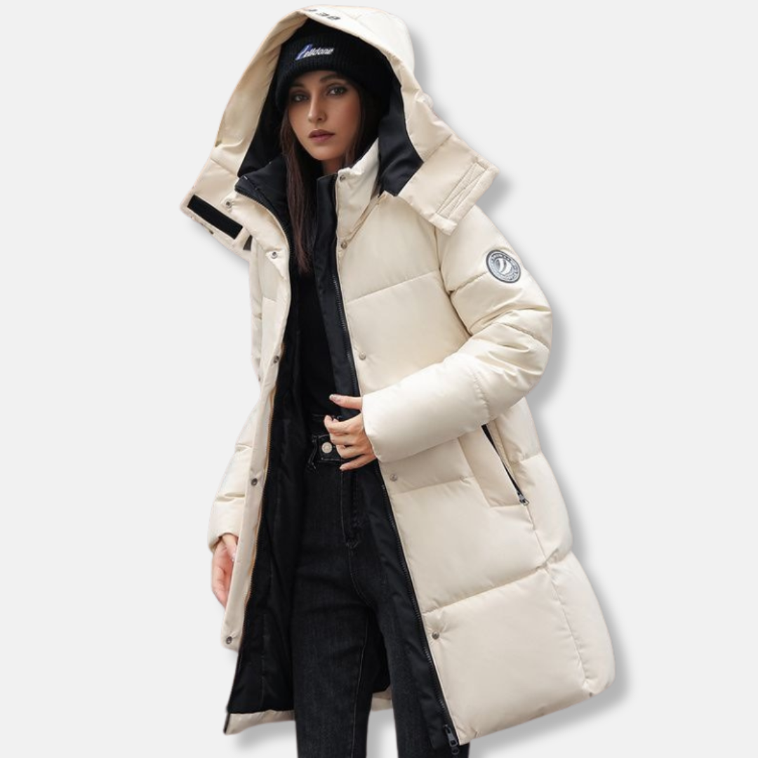 Women's hooded mid-thigh puffer coat in cozy winter style with high collar for city warmth