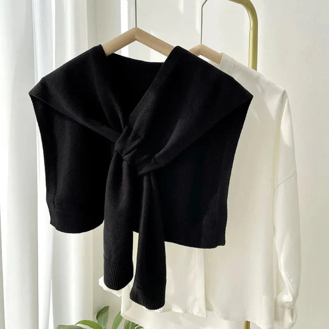 Silky soft preppy knit shawl wrap in neutral tone with elegant tie-front drape for layering