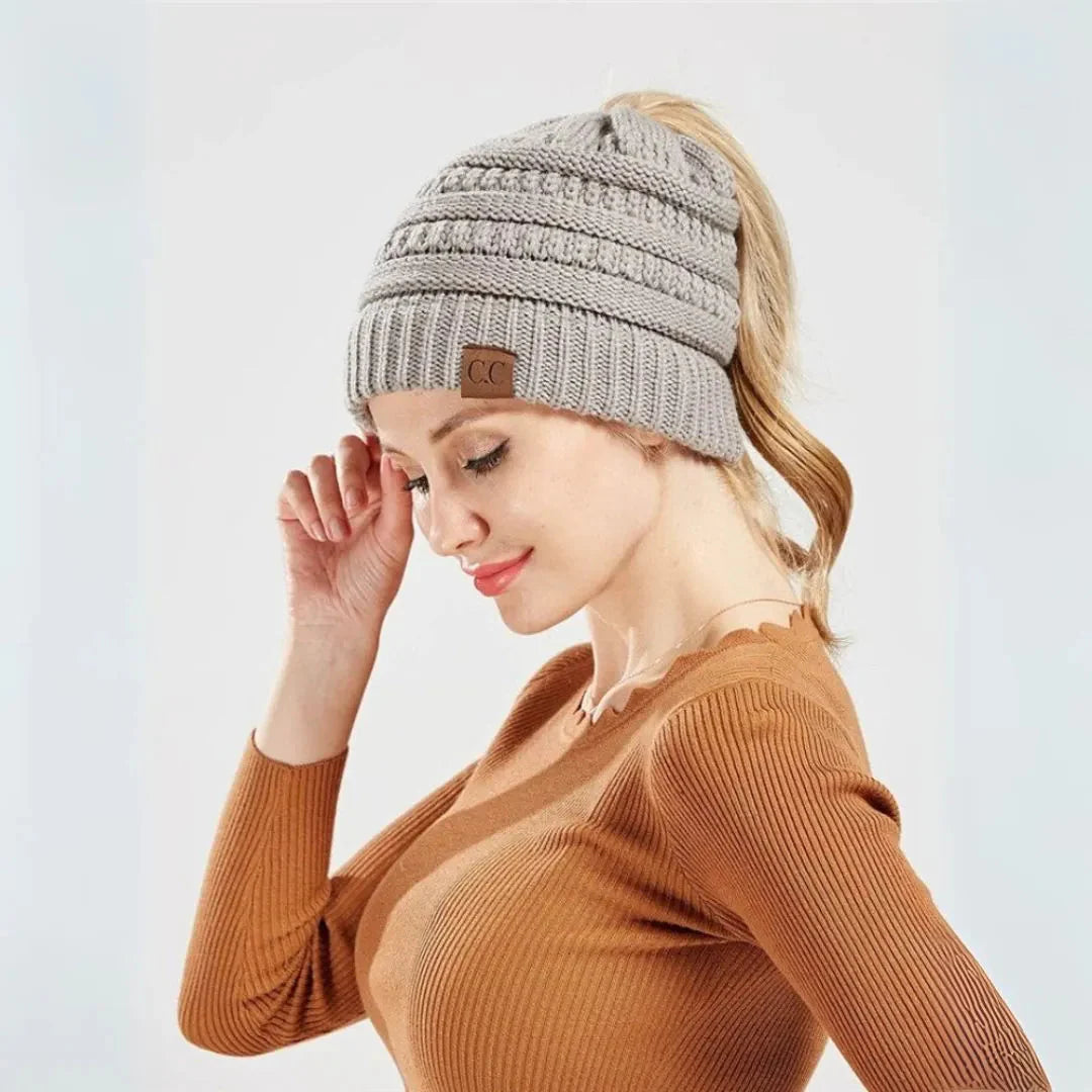 Women's chunky knit ponytail beanie with convenient hair opening slot for everyday warmth