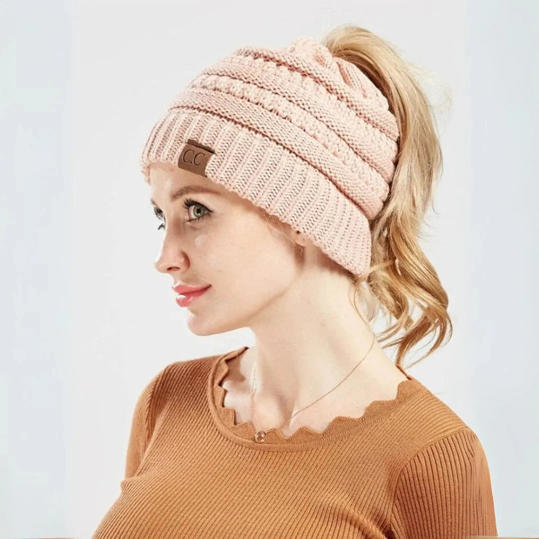 Women's chunky knit ponytail beanie with rear opening slot, cozy relaxed fit winter hat