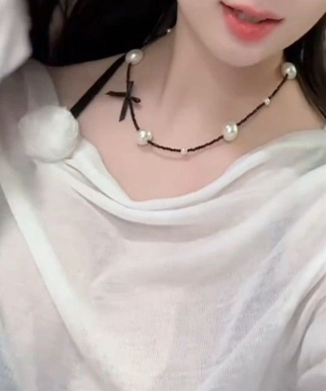 Collier original en acier inoxydable noir avec perles et nœud - Urbann-Vibe