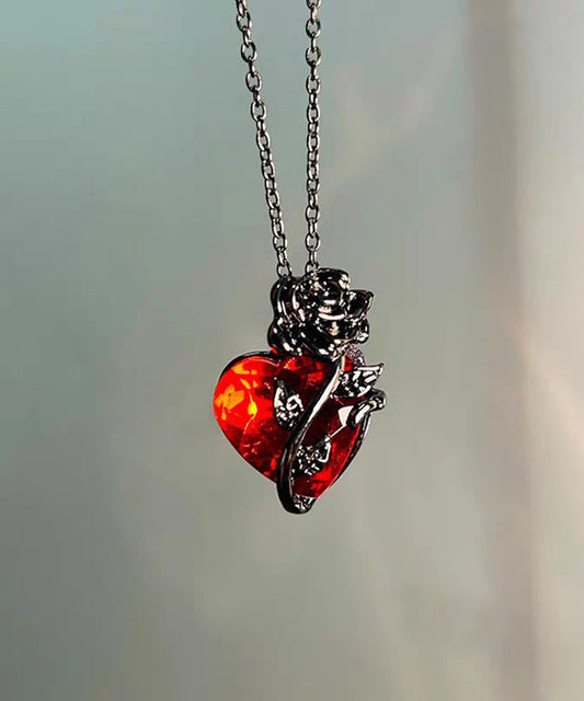 Collier pendentif original en cuivre noir surdoré avec zircon rose Love - Urbann-Vibe