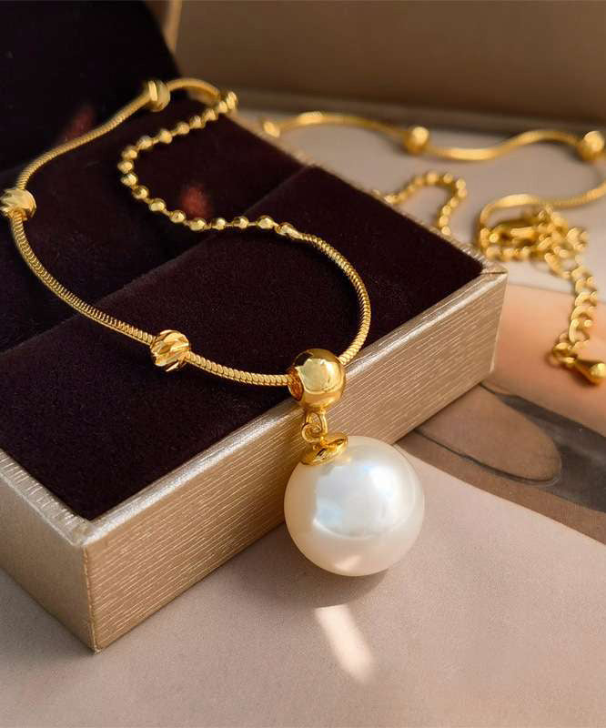 Collier avec pendentif en alliage de cuivre doré et perle au design original - Urbann-Vibe
