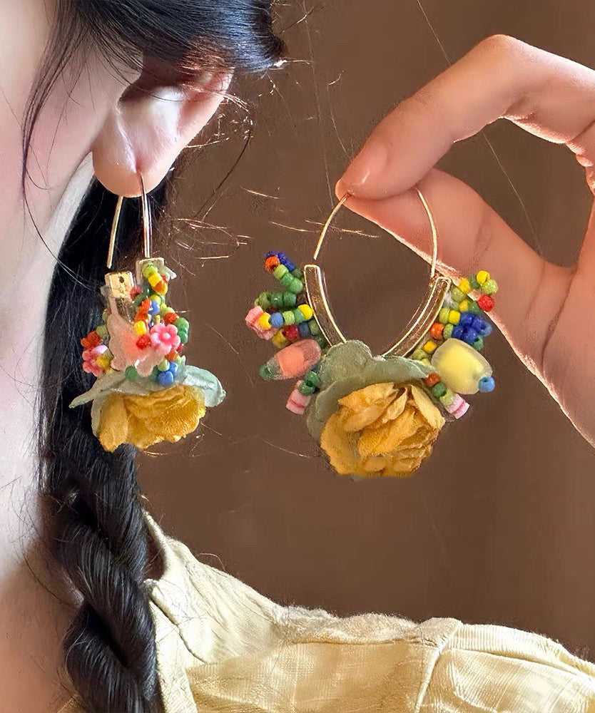 Boucles d'oreilles créoles florales en perles de tulle dorées et cuivrées au design original - Urbann-Vibe