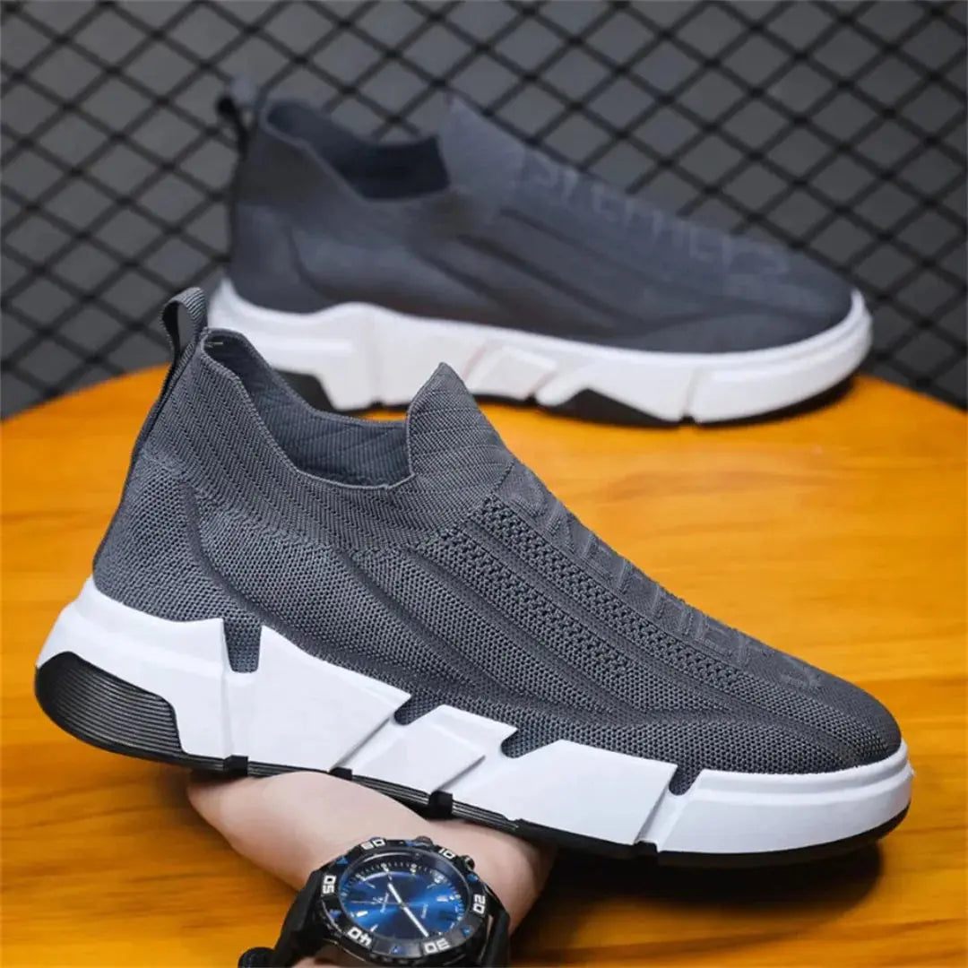 Orion Kinetix urban sneakers with adaptive knit upper, breathable fit, and high-grip rubber sole for city movers