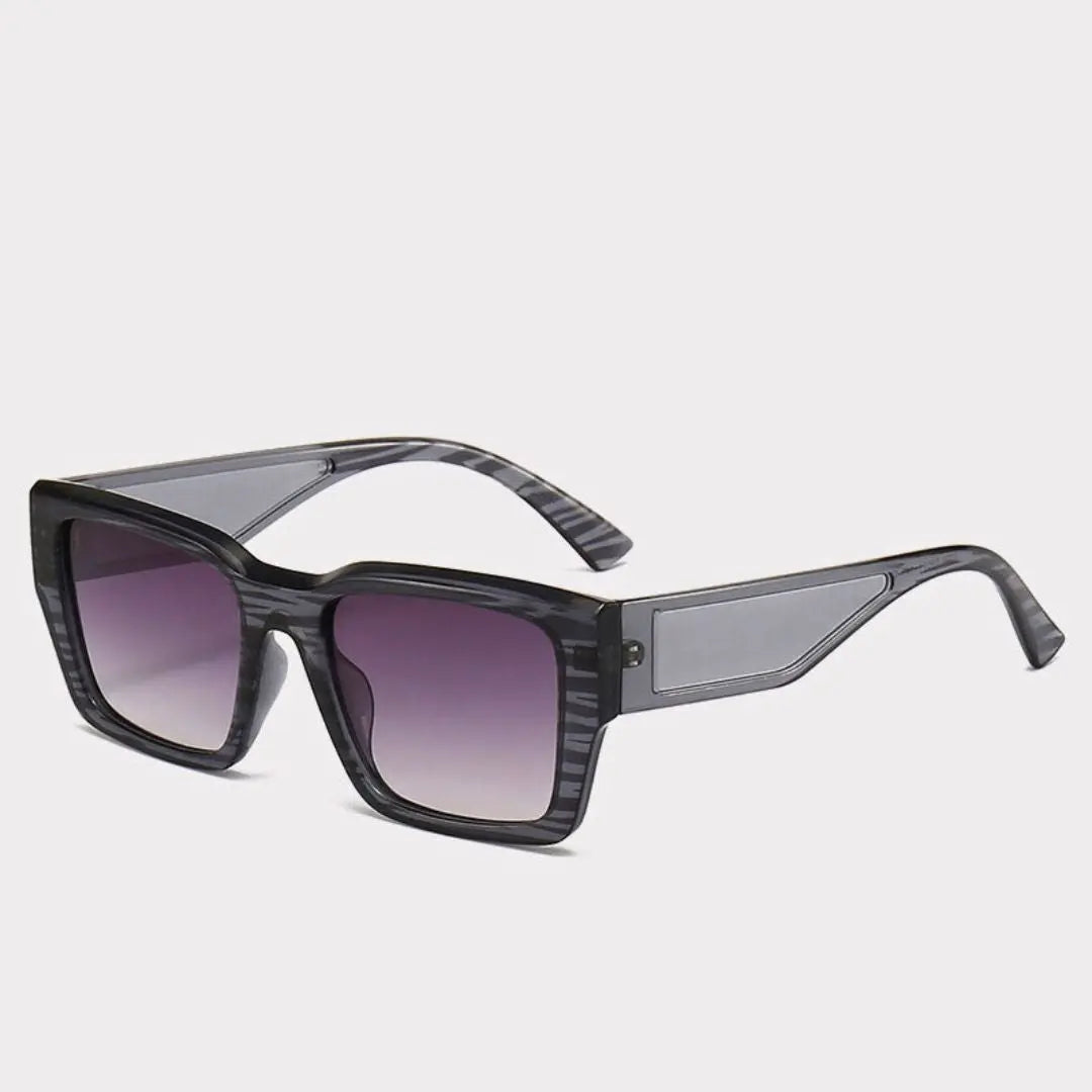 Bold geometric sunglasses with cutout temples and lightweight frames for fashion-forward trendsetters